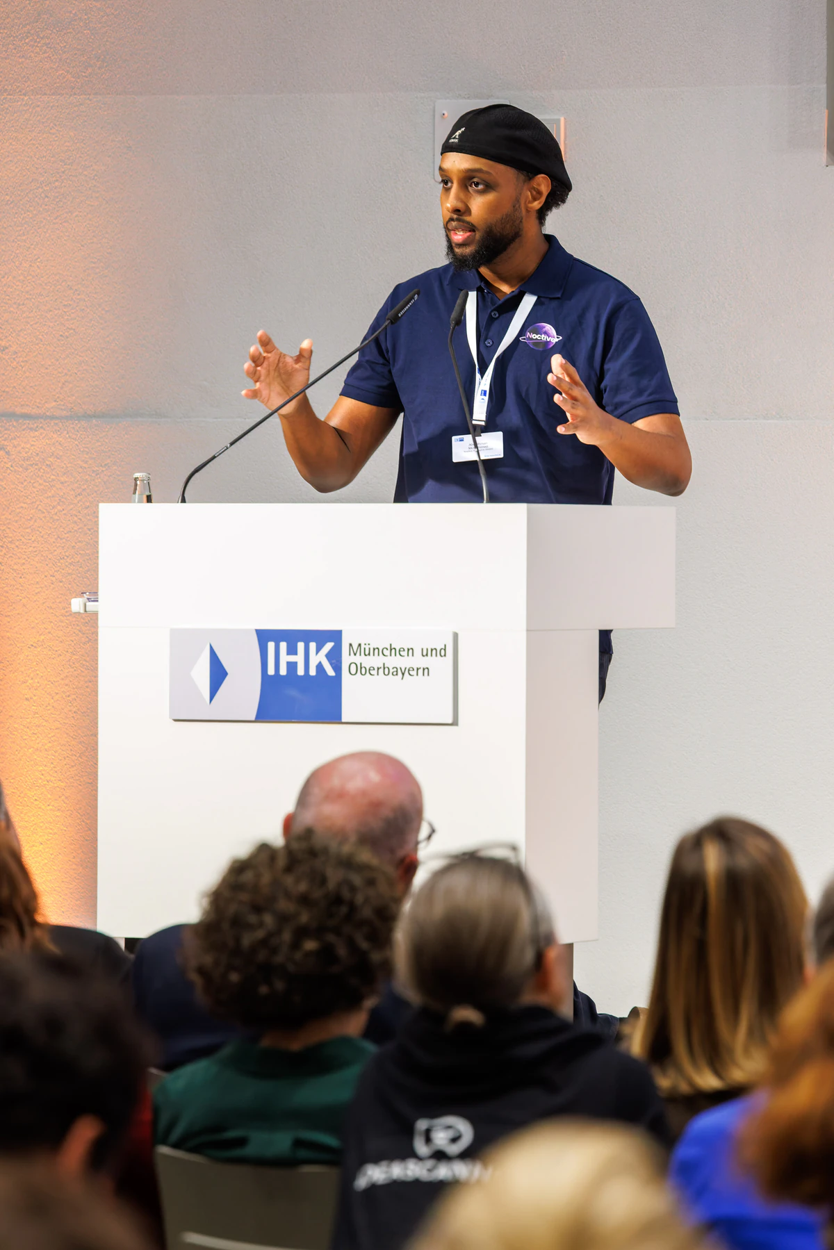 Mahdy Mohamed, COO von Noctive, am Rednerpult der IHK München